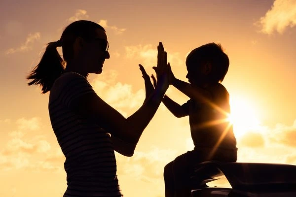 Image of happy mother and child after resolving child arrangements Newport
